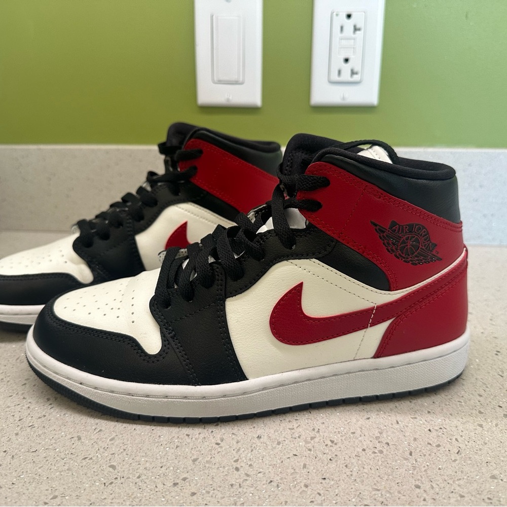 Like New….Jordan Black and White Sneakers